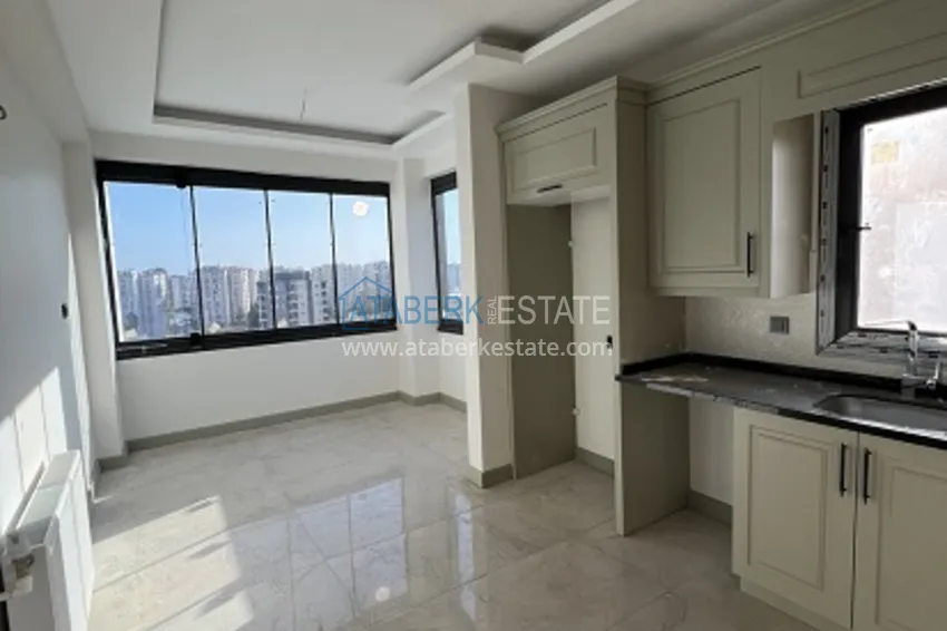 Приобрести Квартира 2+1 с чистовой отделкой и видом на море в районе Мезитли – Мерсин 7 