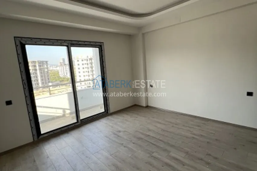 Приобрести Квартира 2+1 с чистовой отделкой и видом на море в районе Мезитли – Мерсин 1 