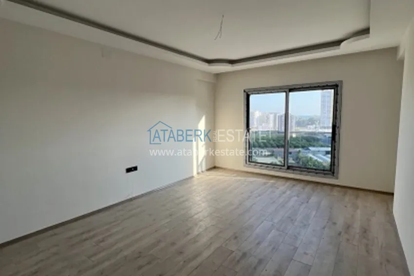 Приобрести Квартира 2+1 с чистовой отделкой и видом на море в районе Мезитли – Мерсин 2 