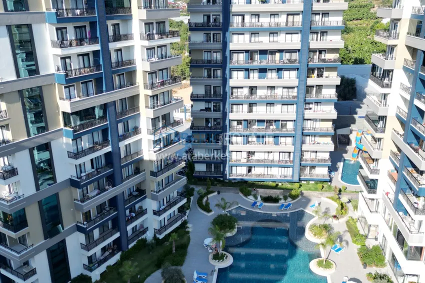 Квартира 1+1 с мебелью и видом на море в комплексе отельного типа, район Махмутлар – Алания 3