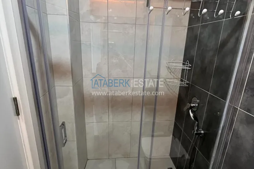 Приобрести Квартира 1+1 с мебелью и видом на море в комплексе отельного типа, район Махмутлар – Алания 11