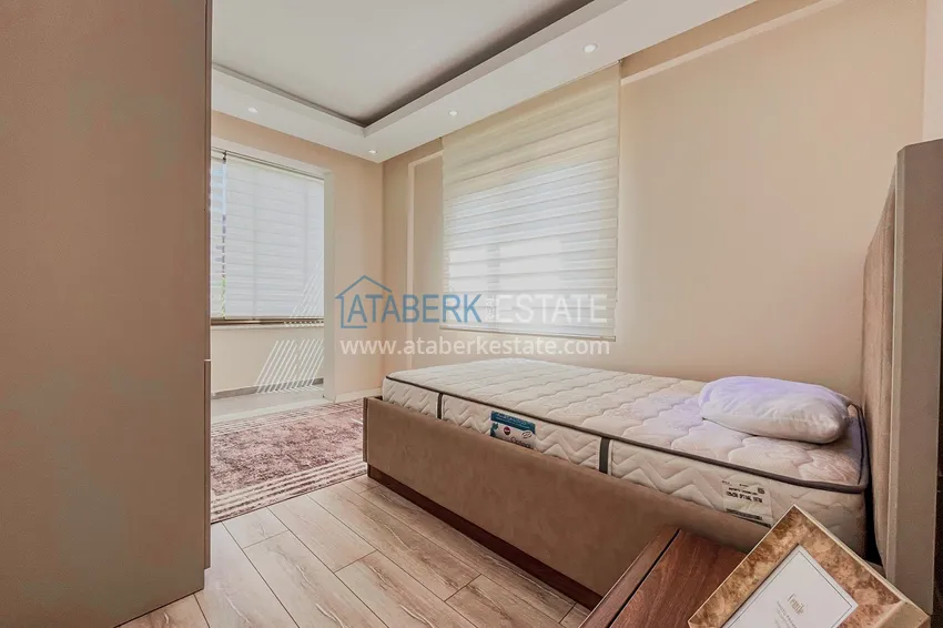 Приобрести Пентхаус-дуплекс 4+1 с мебелью и боковым видом на море в районе Авсаллар 10 