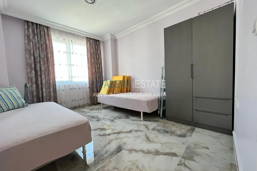 Приобрести Квартира 2+1 с мебелью и застеклённым балконом в центре Алании – район пляжа Клеопатра 11