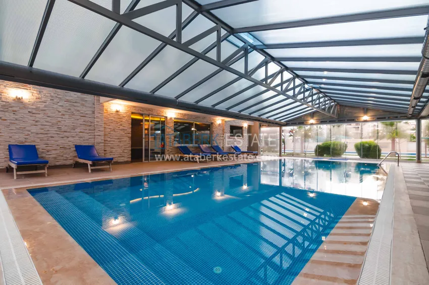 Квартира 2+1 меблированная с отдельной кухней, застеклённым балконом и видом на море, район Кестель – Алания 12 