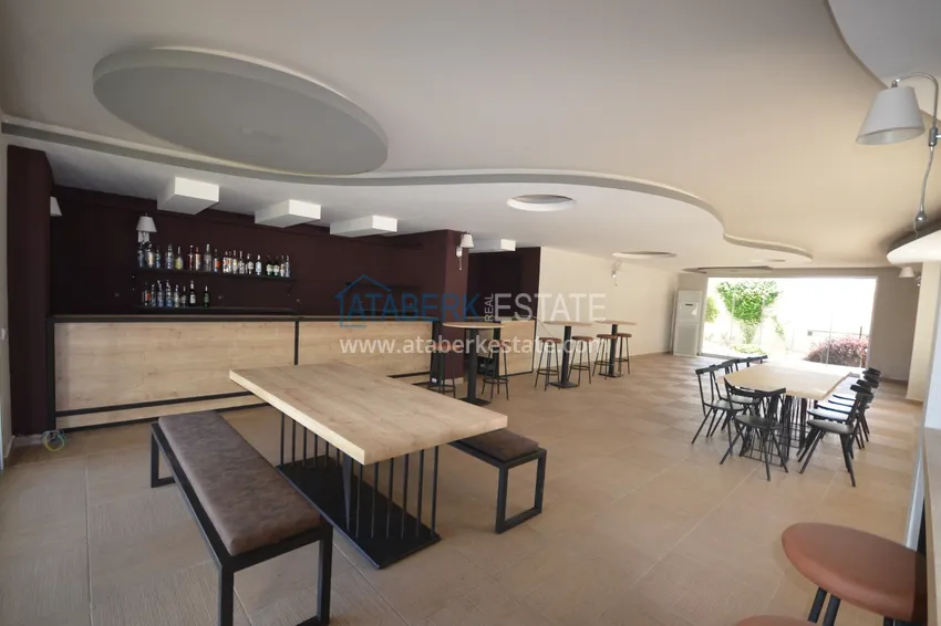 Квартира 2+1 меблированная с отдельной кухней, застеклённым балконом и видом на море, район Кестель – Алания 16 