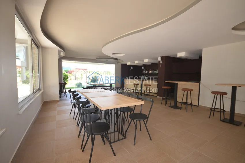 Квартира 2+1 меблированная с отдельной кухней, застеклённым балконом и видом на море, район Кестель – Алания 17 