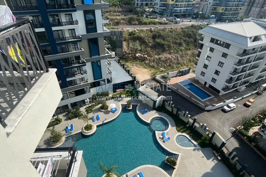 Приобрести Квартира 1+1 с мебелью и видом на море в комплексе отельного типа, район Махмутлар – Алания 15