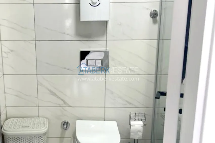 Приобрести Квартира 1+1 с новой мебелью и видом на море в Алании, район Каргыджак – 350 метров от побережья 18