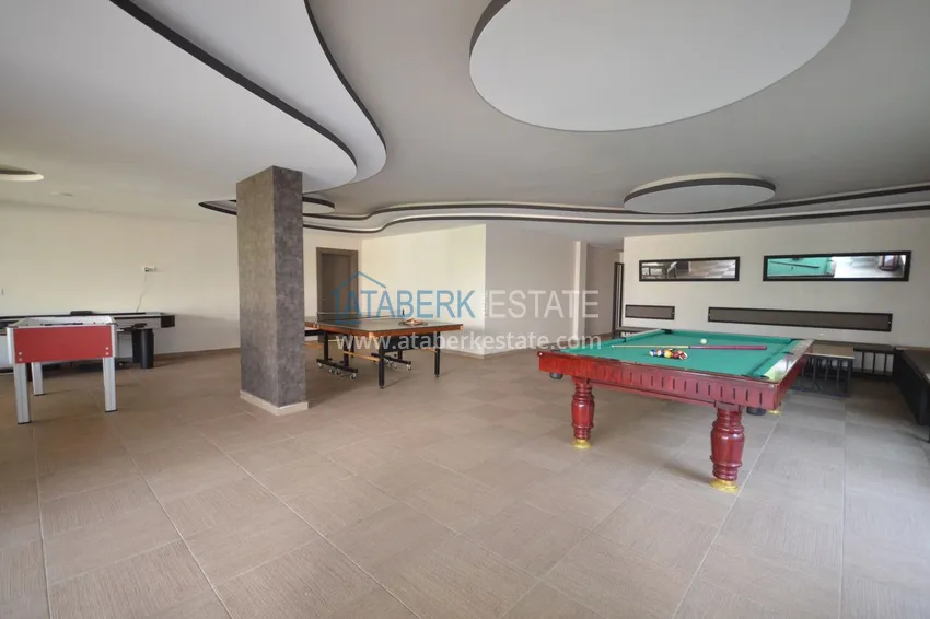 Квартира 2+1 меблированная с отдельной кухней, застеклённым балконом и видом на море, район Кестель – Алания 21 