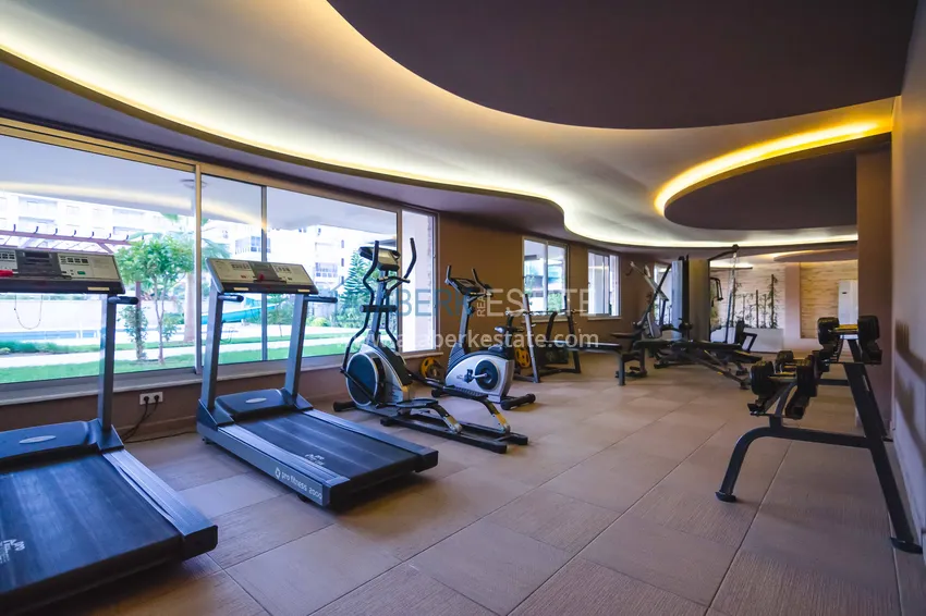 Квартира 2+1 меблированная с отдельной кухней, застеклённым балконом и видом на море, район Кестель – Алания 23 