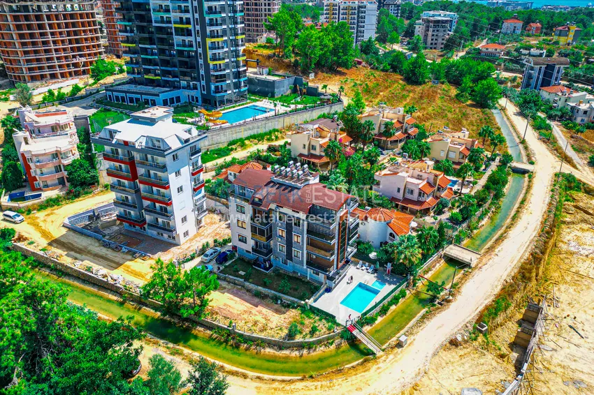 Пентхаус-дуплекс 4+1 с мебелью и боковым видом на море в районе Авсаллар 2 