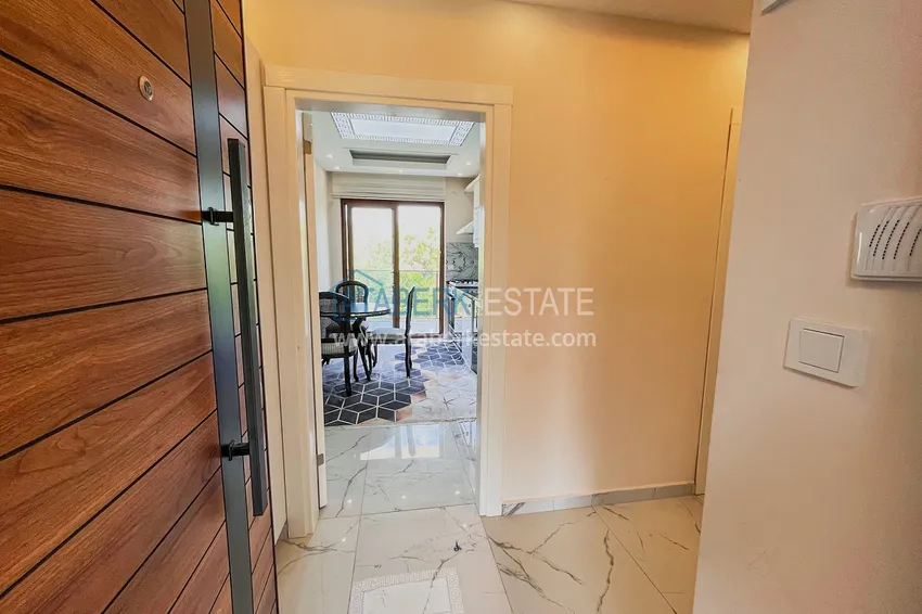 Приобрести Пентхаус-дуплекс 4+1 с мебелью и боковым видом на море в районе Авсаллар 1 