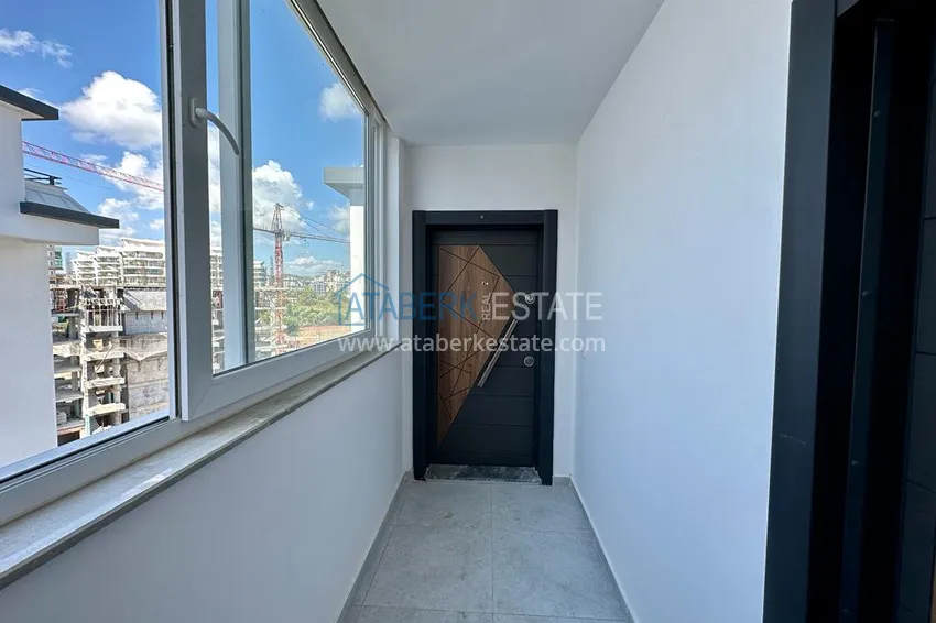 Приобрести Квартира 2+1 в Авсалларе с частичным видом на море в новом комплексе. Подходит для краткосрочной аренды 1 