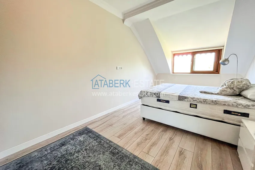 Приобрести Пентхаус-дуплекс 4+1 с мебелью и боковым видом на море в районе Авсаллар 19 