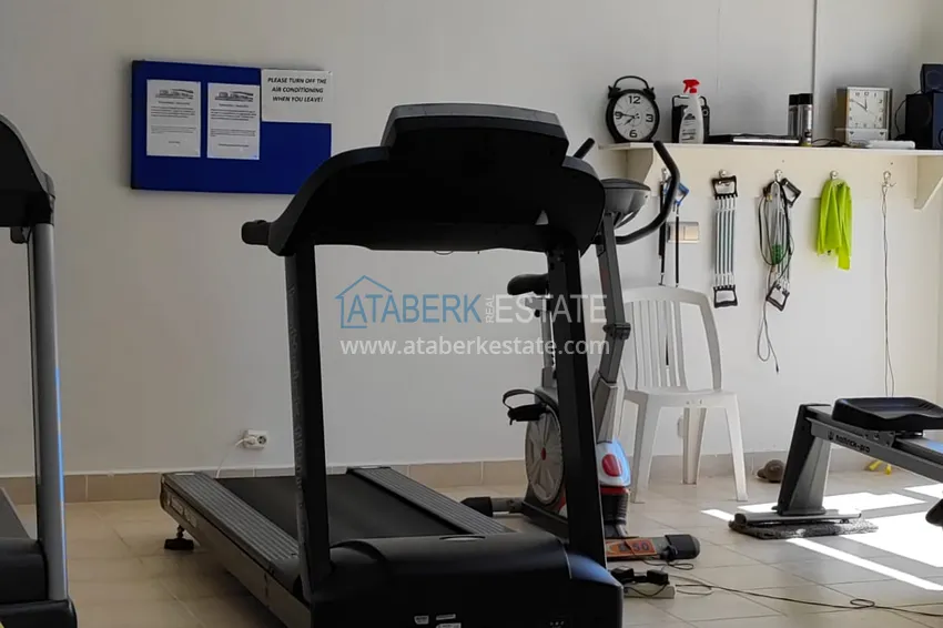 Видовая трехкомнатная квартира с мебелью, застекленным балконом в районе Махмутлар 24 