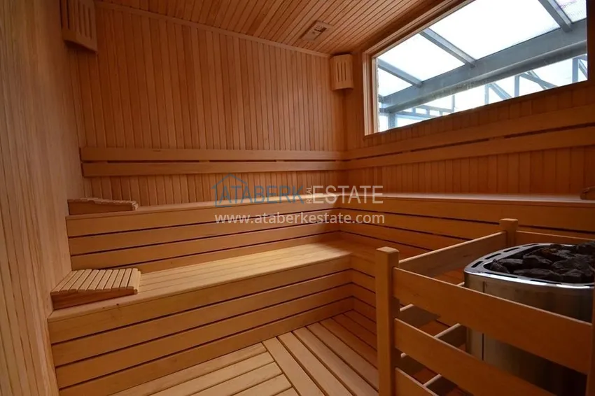 Квартира 2+1 меблированная с отдельной кухней, застеклённым балконом и видом на море, район Кестель – Алания 26 