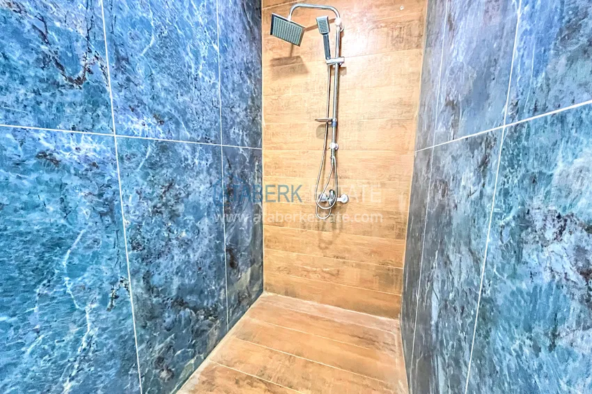 Приобрести Пентхаус-дуплекс 4+1 с мебелью и боковым видом на море в районе Авсаллар 22 