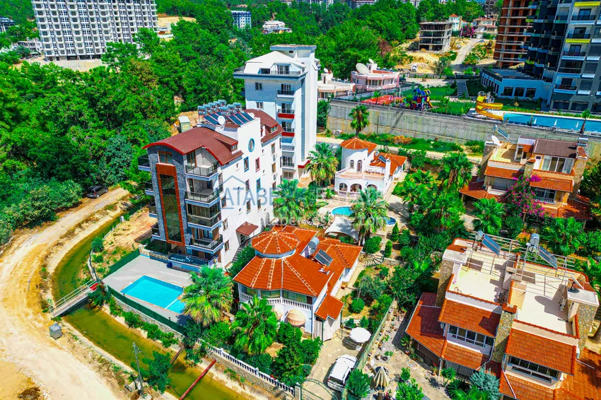 Пентхаус-дуплекс 4+1 с мебелью и боковым видом на море в районе Авсаллар 3 