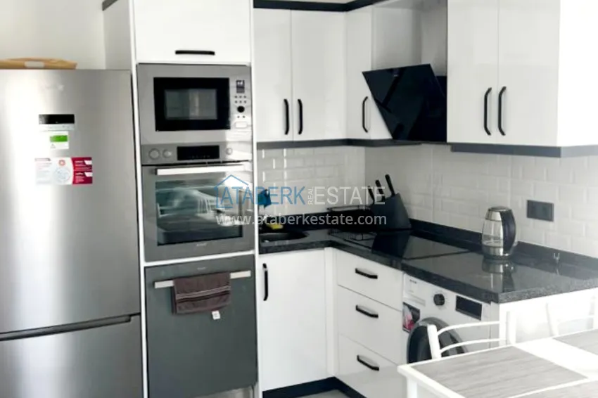 Приобрести Квартира 1+1 с новой мебелью и видом на море в Алании, район Каргыджак – 350 метров от побережья 4