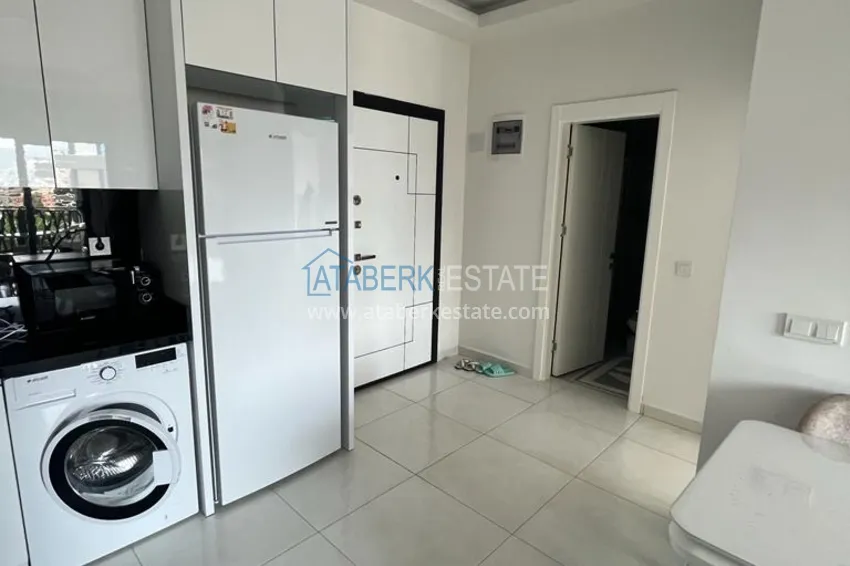 Приобрести Квартира 1+1 с мебелью и видом на море в комплексе отельного типа, район Махмутлар – Алания 5