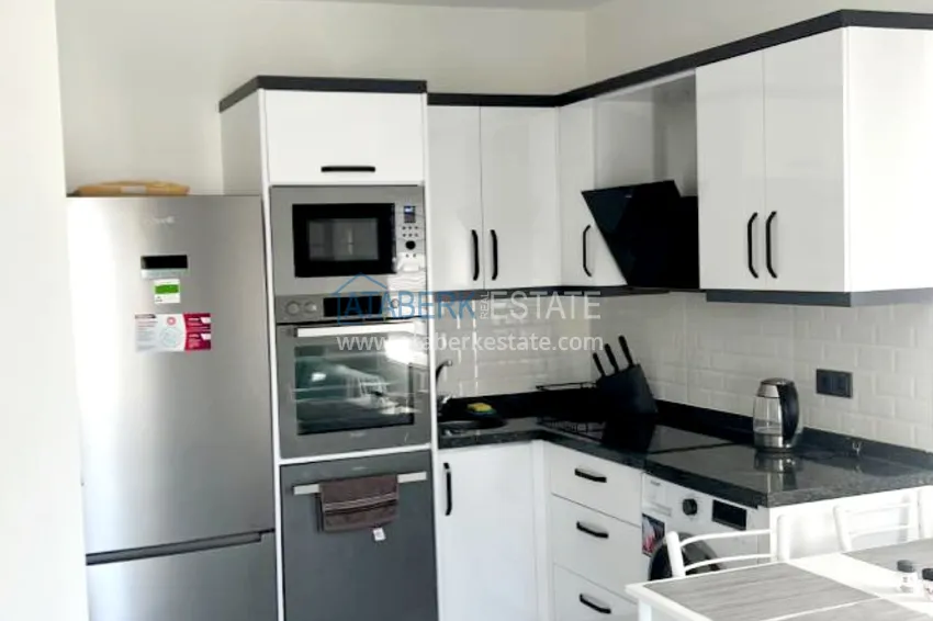 Приобрести Квартира 1+1 с новой мебелью и видом на море в Алании, район Каргыджак – 350 метров от побережья 6