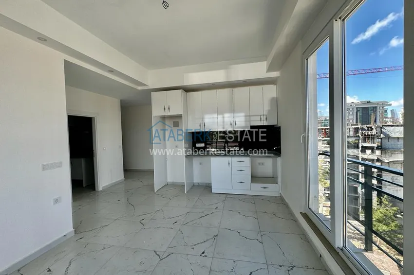 Приобрести Квартира 2+1 в Авсалларе с частичным видом на море в новом комплексе. Подходит для краткосрочной аренды 4 