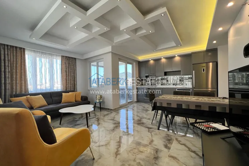 Приобрести Квартира 2+1 с мебелью и застеклённым балконом в центре Алании – район пляжа Клеопатра 4