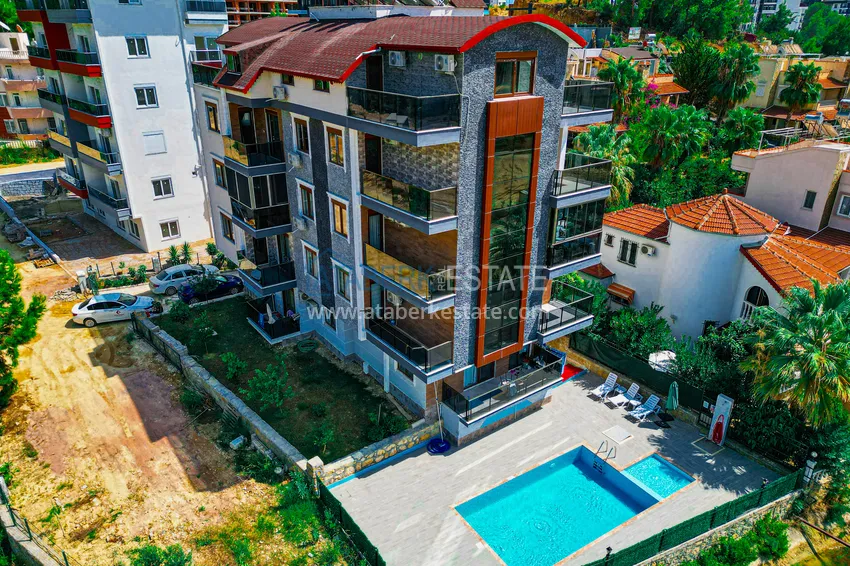 Пентхаус-дуплекс 4+1 с мебелью и боковым видом на море в районе Авсаллар 5 