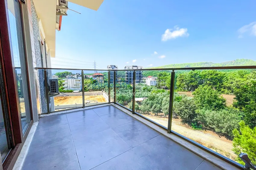 Приобрести Пентхаус-дуплекс 4+1 с мебелью и боковым видом на море в районе Авсаллар 5 