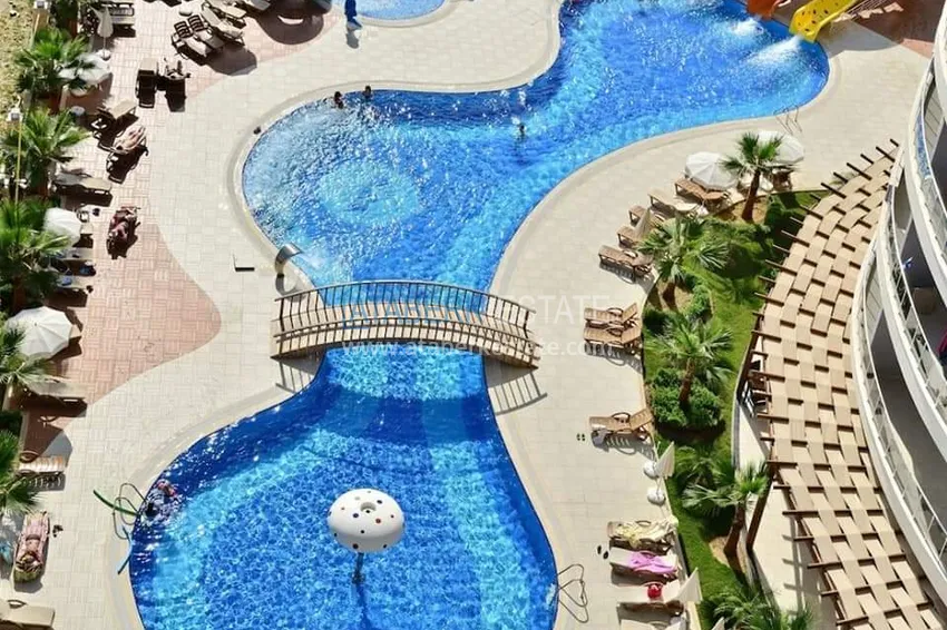 Квартира 1+1 с мебелью и видом на море в районе Джикджилли, Алания 8