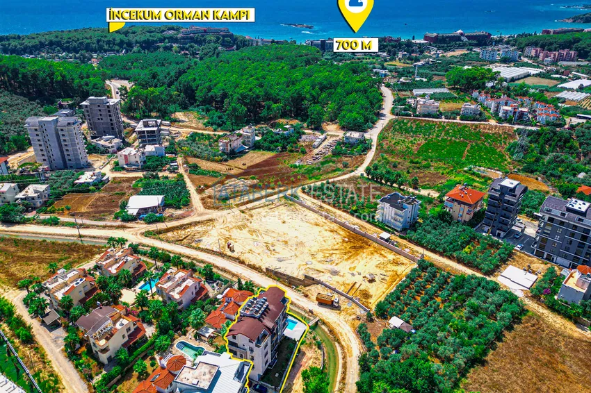 Пентхаус-дуплекс 4+1 с мебелью и боковым видом на море в районе Авсаллар 6 