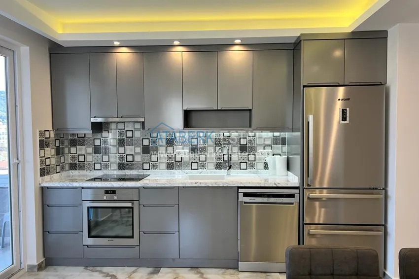 Приобрести Квартира 2+1 с мебелью и застеклённым балконом в центре Алании – район пляжа Клеопатра 7