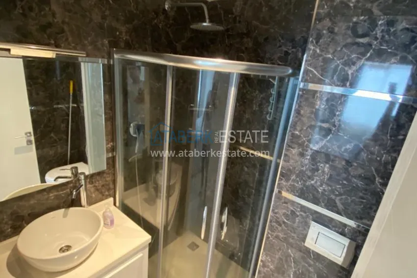 Приобрести Квартира 2+1 меблированная с отдельной кухней, застеклённым балконом и видом на море, район Кестель – Алания 8 