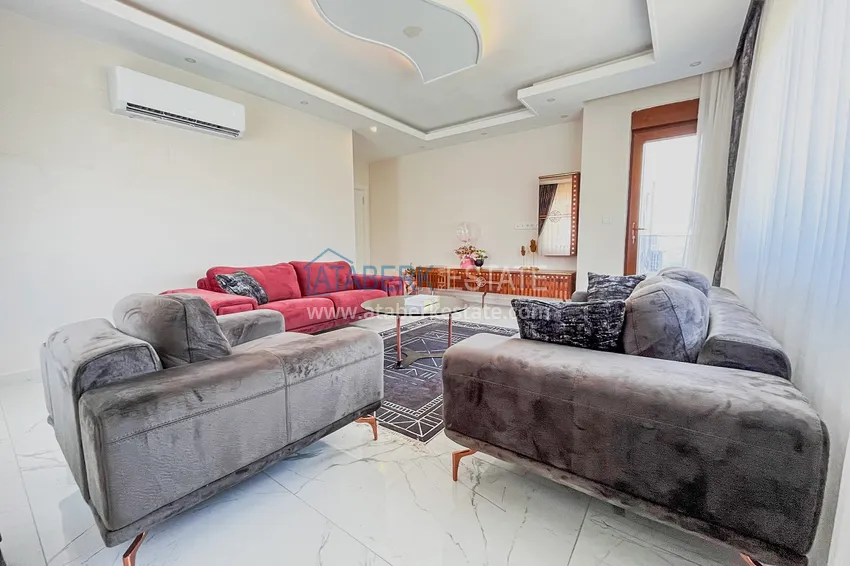 Приобрести Пентхаус-дуплекс 4+1 с мебелью и боковым видом на море в районе Авсаллар 8 