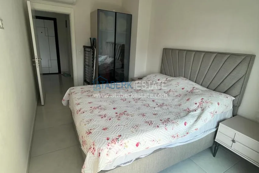 Приобрести Квартира 1+1 с мебелью и видом на море в комплексе отельного типа, район Махмутлар – Алания 9