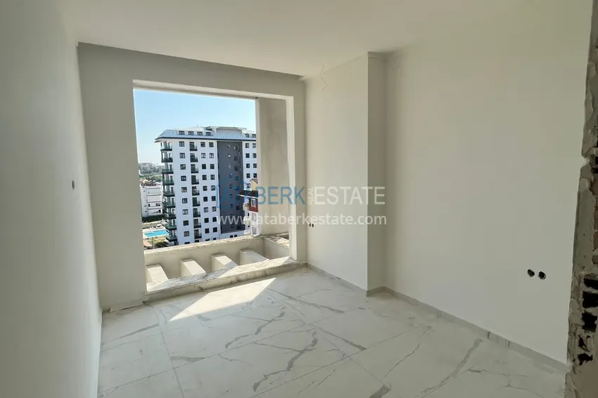 Приобрести Двухкомнатная квартира с чистовой отделкой в комфортабельном комплексе – Алания, район Авсаллар 4