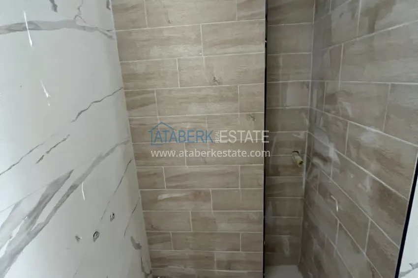 Приобрести Двухкомнатная квартира с чистовой отделкой в комфортабельном комплексе – Алания, район Авсаллар 9