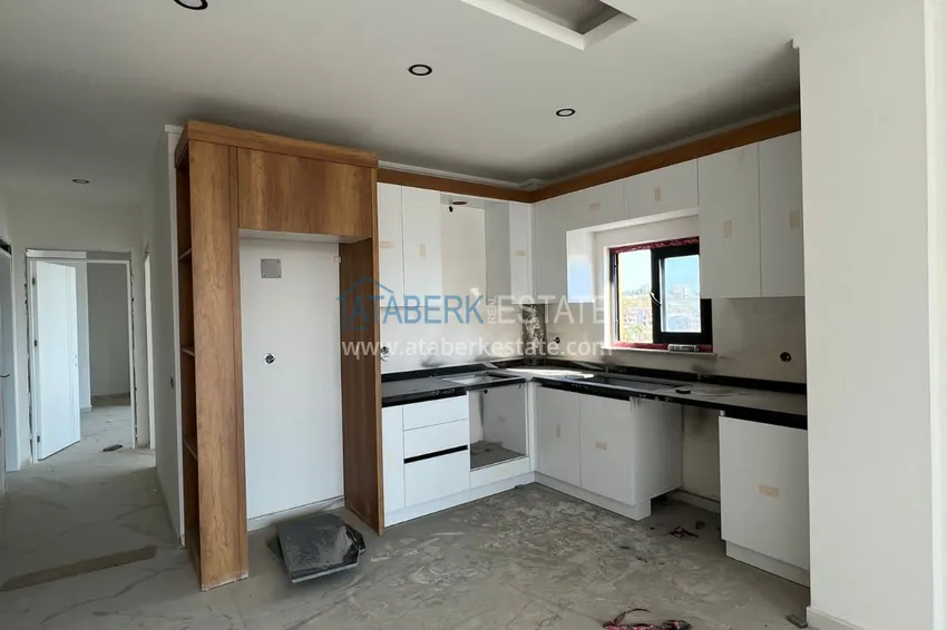 Приобрести Двухкомнатная квартира с чистовой отделкой в комфортабельном комплексе – Алания, район Авсаллар 13