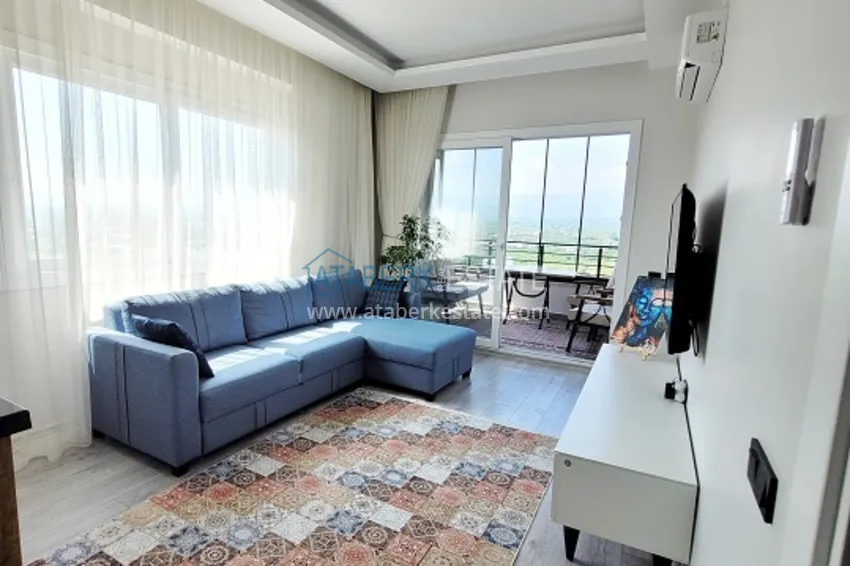 Приобрести Квартира 2+1 меблированная с техникой и видом на море и горы Томюк – Мерсин 2 