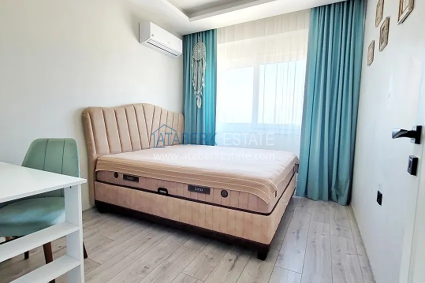 Приобрести Квартира 2+1 меблированная с техникой и видом на море и горы Томюк – Мерсин 7 