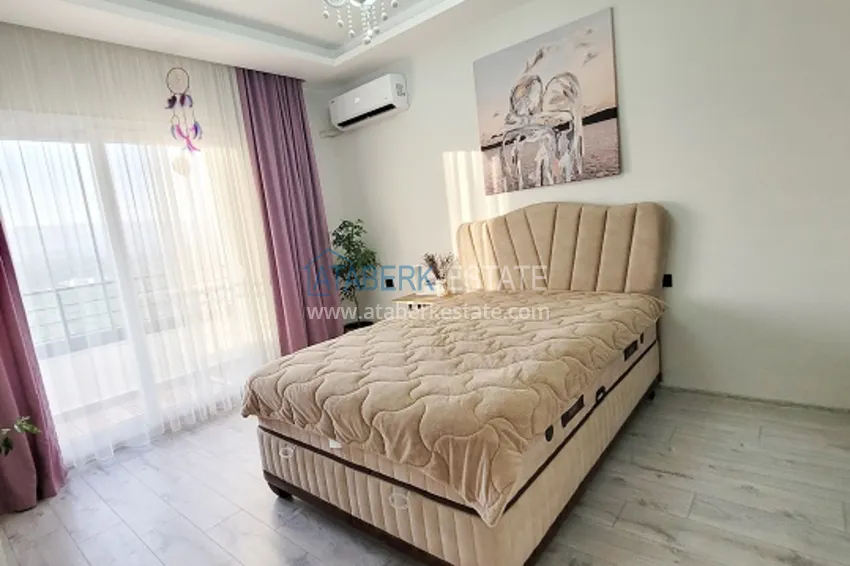 Приобрести Квартира 2+1 меблированная с техникой и видом на море и горы Томюк – Мерсин 8 