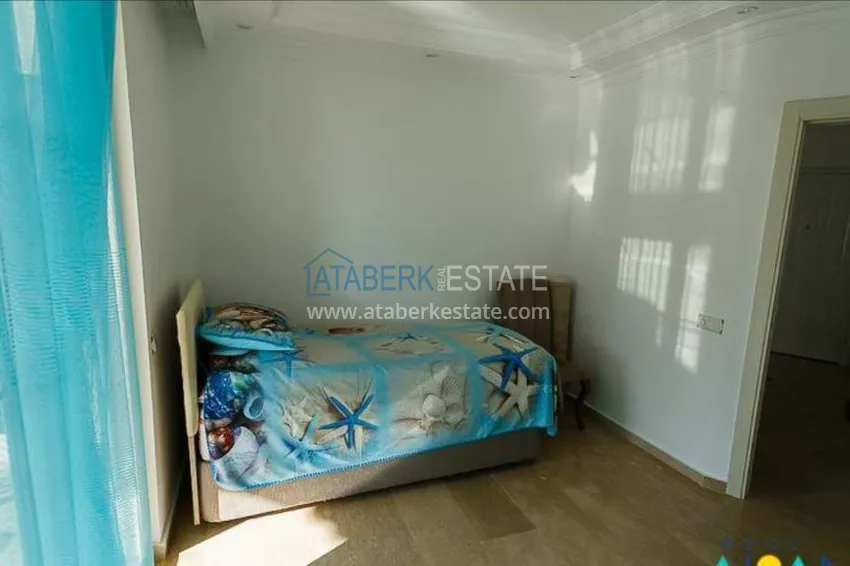 Приобрести Трехкомнатная меблированная квартира с видом на горы в районе Тосмур 11