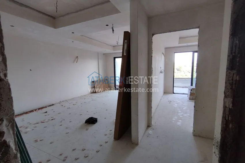 Фото - Квартира 1+1 площадью 85 м2 от инвестора в строящемся комплекс-отеле - Алания, район Тюрклер 11
