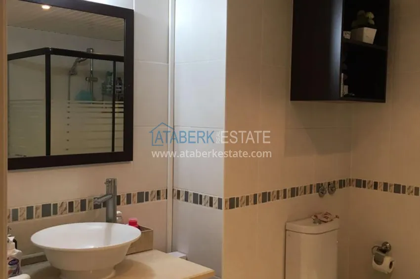 Приобрести Трехкомнатная меблированная квартира с видом на горы в районе Тосмур 12