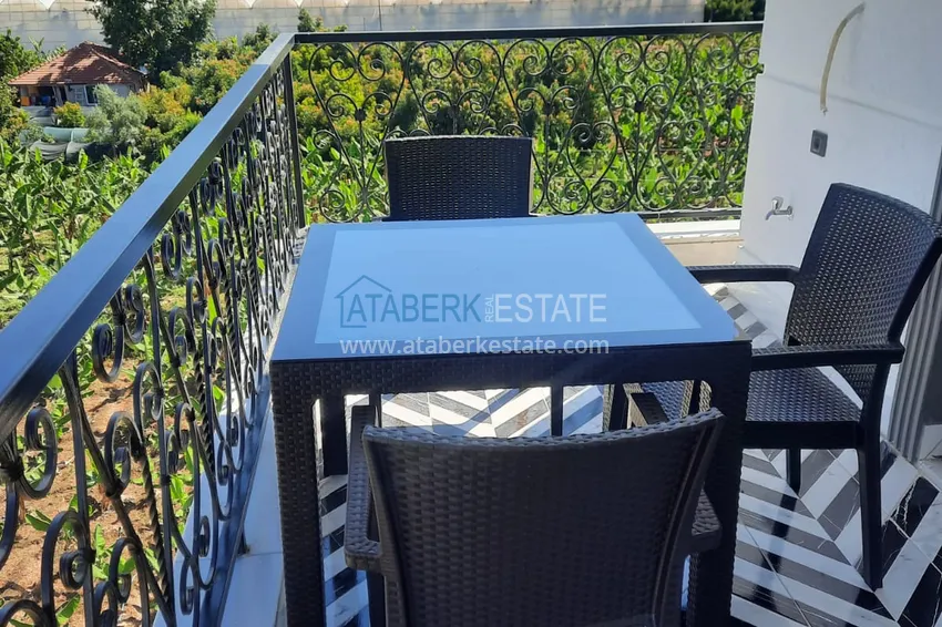 Приобрести Меблированная двухкомнатная квартира в районе Каргыджак – 250 метров от моря 11 