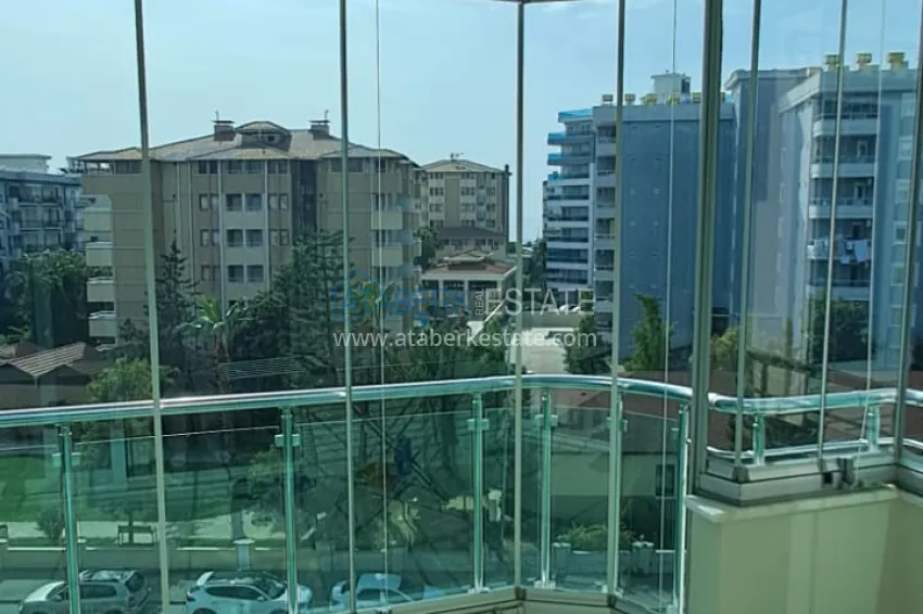 Приобрести Квартира 2+1 в Алании район Тосмур, меблированная с застекленным балконом. Недвижимость под ВНЖ 13 