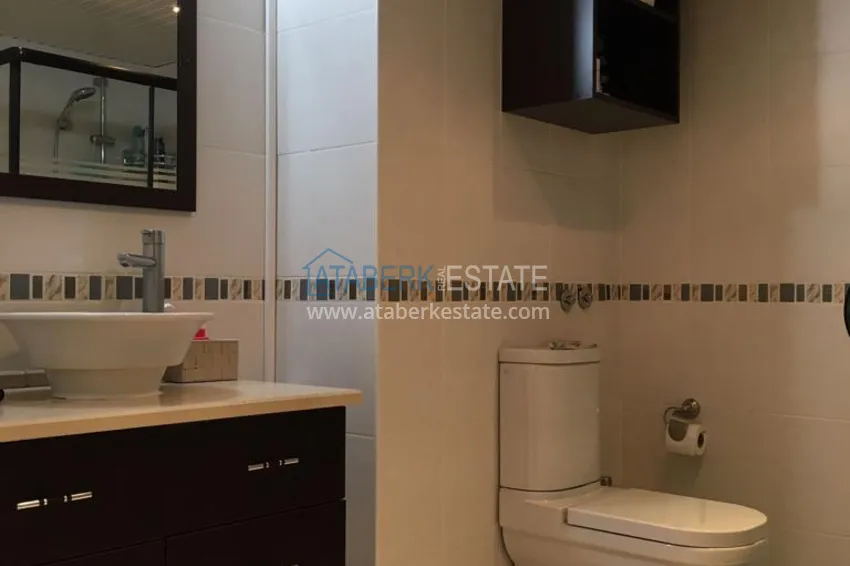 Приобрести Трехкомнатная меблированная квартира с видом на горы в районе Тосмур 13