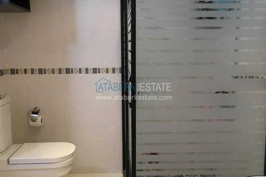 Приобрести Трехкомнатная меблированная квартира с видом на горы в районе Тосмур 14