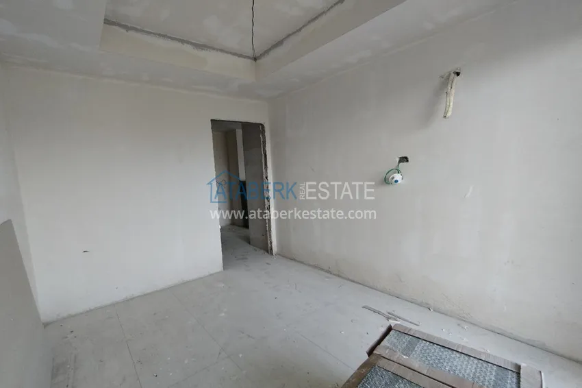 Фото - Квартира 1+1 площадью 85 м2 от инвестора в строящемся комплекс-отеле - Алания, район Тюрклер 14