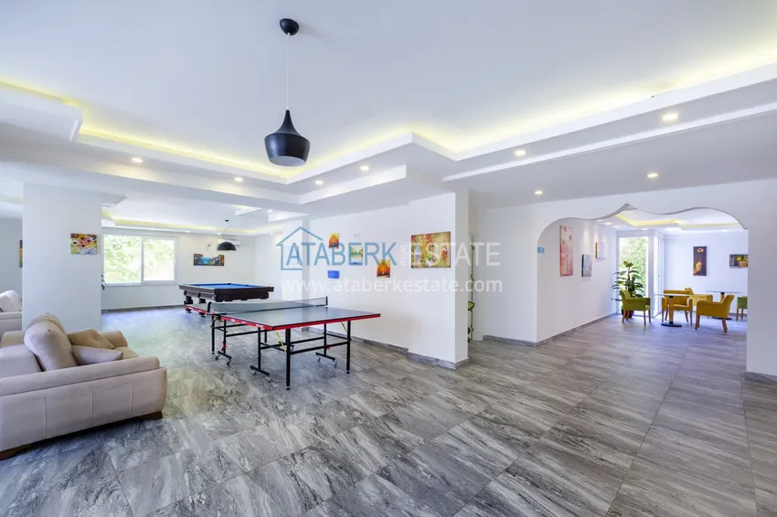 Квартира 1+1 меблированная с боковым видом на море, район Кестель – Алания 24